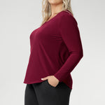 The Leith Top in Ruby is the long-sleeve evolution of our beloved Jules Top, designed for ultimate comfort and layering ease. Perfect as a standalone piece or worn under jackets and knitwear, this fitted women’s top is a must-have staple for cooler days and transitional weather. Proudly Australian made and available in sizes 8 to 24, it’s crafted from a soft-stretch, dry-touch jersey that feels as good as it looks.