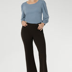 Designed for versatility, it features a classic bootcut leg that enhances and elongates your silhouette, making it ideal for both office wear and everyday styling. Discreet side pockets with refined topstitch detailing add a functional yet polished finish.