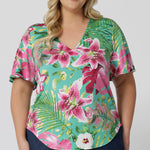 Plus sized model wears easy care top. This on-the-go style is Australian made using slinky jersey fabric. Travel ready top is perfect for any summer occasion. This top effortlessly elevates your style while keeping you comfortable in the summer months. Clothing brand Leina & Fleur stocks sizes 8-24.