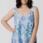 A good sleep  and loungewear top for petite women, a size 10 woman wears this blue ,white and green print cami top with wide shoulder straps. In eco-friendly modal fabric this top is breathable and thermo regulating and a good pyjamas for night  sweats. Create the perfect pajama set with the matching pyjama pants or bamboo jersey lounge pants.