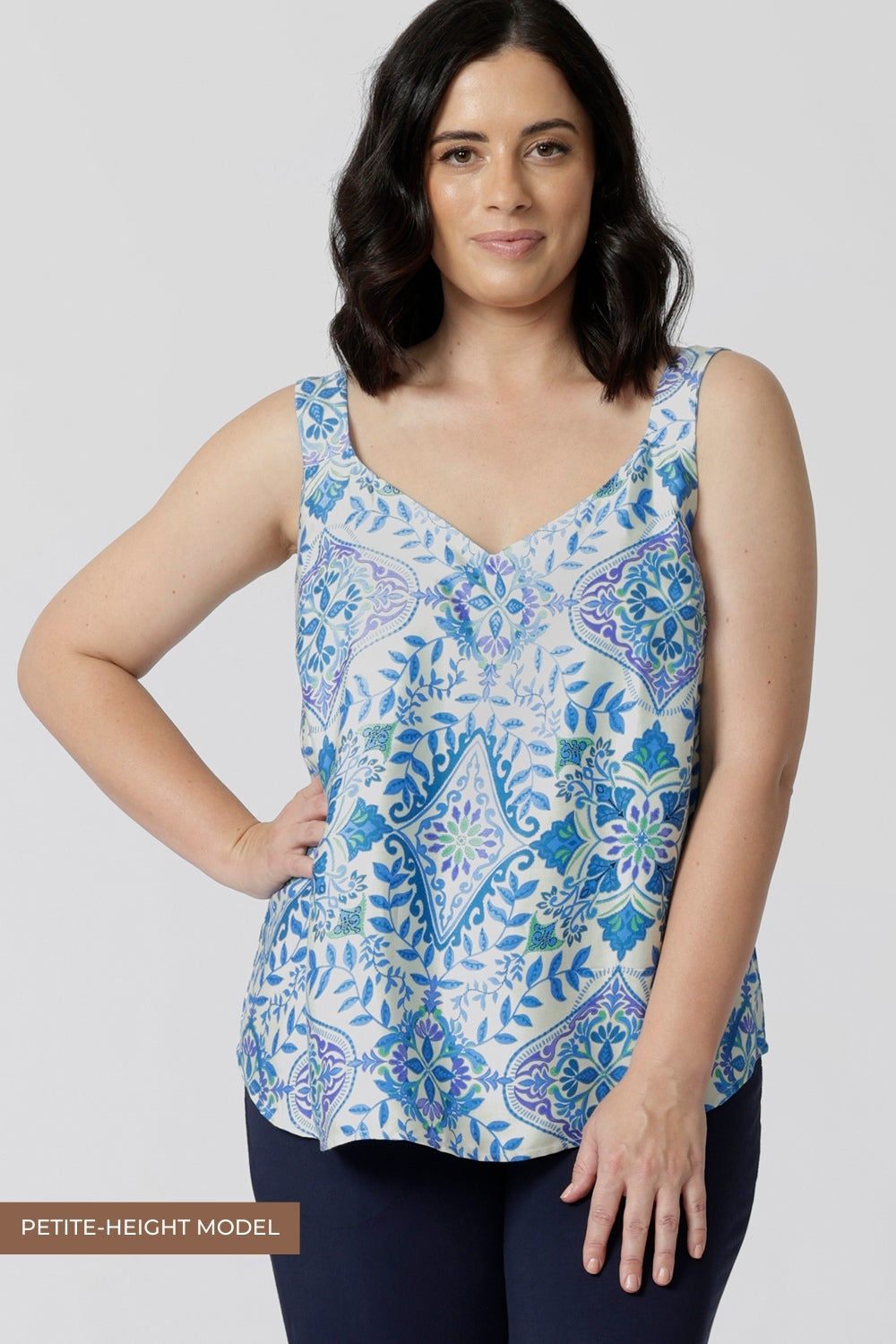 A good sleep  and loungewear top for petite women, a size 10 woman wears this blue ,white and green print cami top with wide shoulder straps. In eco-friendly modal fabric this top is breathable and thermo regulating and a good pyjamas for night  sweats. Create the perfect pajama set with the matching pyjama pants or bamboo jersey lounge pants.