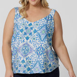 A good sleep  and loungewear top for plus size women, a size 18 woman wears this blue ,white and green print cami top with wide shoulder straps. In eco-friendly modal fabric this top is brathebal and thermo regulating and a good top for night  sweats. Create the perfect pajama set with this cami top and matching pyjama bottoms for women. 