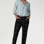 The Lulu Pant, a contemporary take on classic tailoring. With a mid-rise fit, slim tapered leg, and ankle-length finish, the Lulu brings a sleek, modern edge to both workwear and smart-casual styling. The tailored waistband features a fly fastening with a hook and bar closure for a clean front, while angled front pockets, back darts, and belt loops complete the look with refined detail.