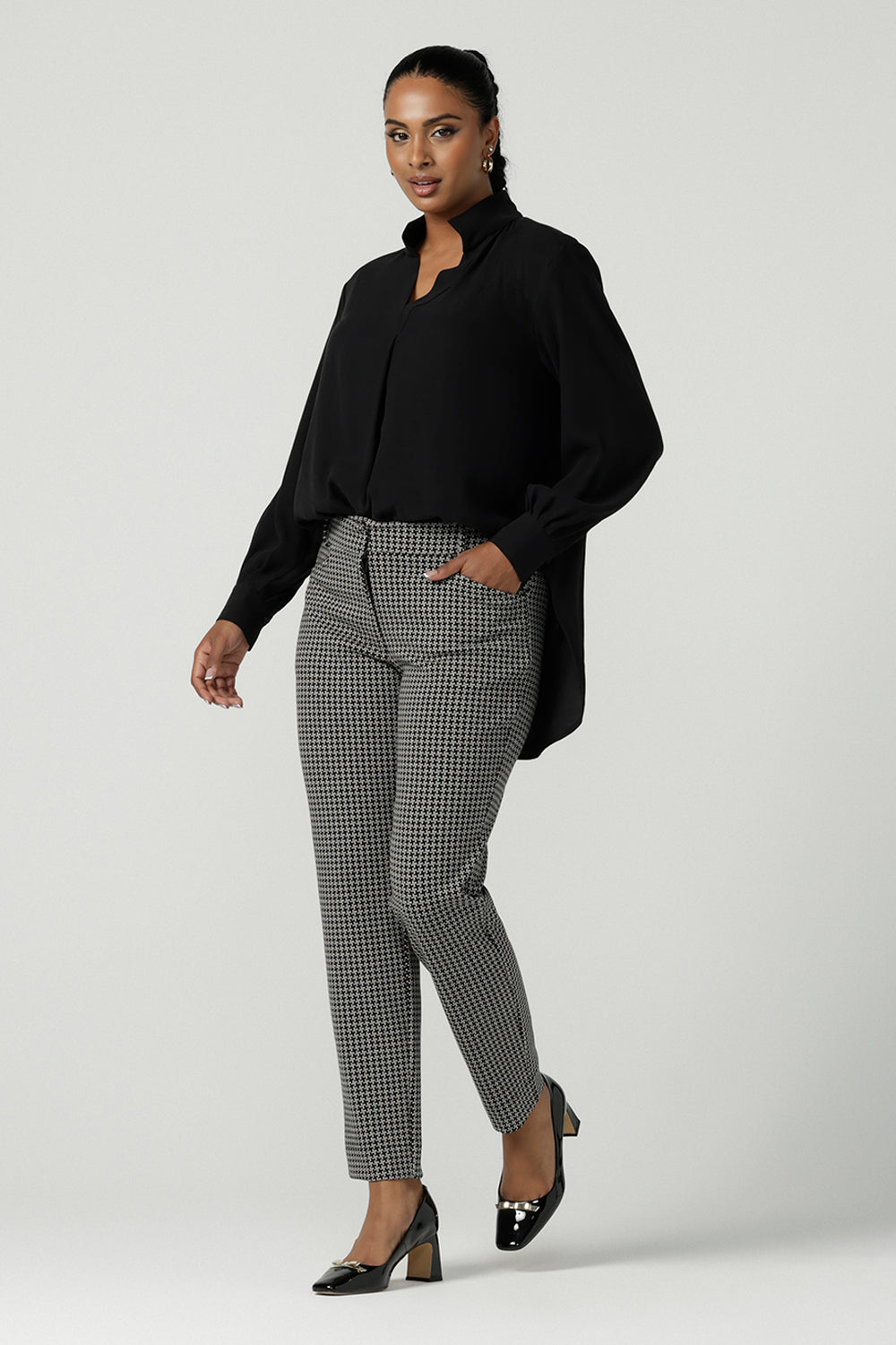 Back view of a A size 10 woman wears the Lulu Tailored pant in Jacquard. A slim fit tailored pant in comfortable ponte for petite to plus size. Made in Australia for women size 8-24 Styled back with a Ellery shirt in Tencel and styled back with a black pump. 