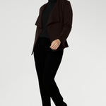 Australian made and thoughtfully designed for modern versatility. Crafted from a luxe Modal stretch fabric, this easy-care piece offers both warmth and elegance—perfect for layering during the cooler months. The Lyndon features a flattering wrap-style silhouette with angled front panels that drape beautifully, and tailored darts at the back to enhance shape.