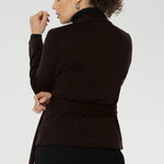 The Lyndon features a flattering wrap-style silhouette with angled front panels that drape beautifully, and tailored darts at the back to enhance shape. 
