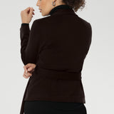 The Lyndon features a flattering wrap-style silhouette with angled front panels that drape beautifully, and tailored darts at the back to enhance shape. 