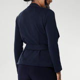 Lyndon features a double-layer jacket with   angled front panels for a modern edge and a detachable waist tie with belt loops, allowing you to wear it open or cinched to define your silhouette. Available in size 8-24