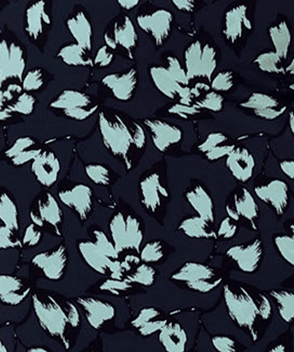 swatch of aqua blue floral print on navy blue dry touch jersey fabric, used by Australian and New Zealand women's clothing brand Leina & Fleur to make a collection of wrap dresses and work wear tops.