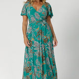 This women's summer maxi dress is the perfect blend of style and comfort, ideal for summer events. Made from a lightweight dry-touch jersey fabric, it features a rich jade colour with abstract animal print details. Available in sizes 8-24.