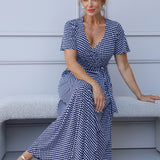 Event ready maxi dress from Leina & Fleur combines effortless style with functionality. It features a functioning wrap design with extended waist ties, allowing you to adjust the fit to your shape for a flattering silhouette. Available in sizes 8-24.