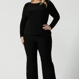 Black Mason top in size 18. Made in Australia for women size 8 - 24. Long sleeve top made in easy care jersey. Made in Australia for women size 8 - 24. Styled bak with Brett pant in black. 