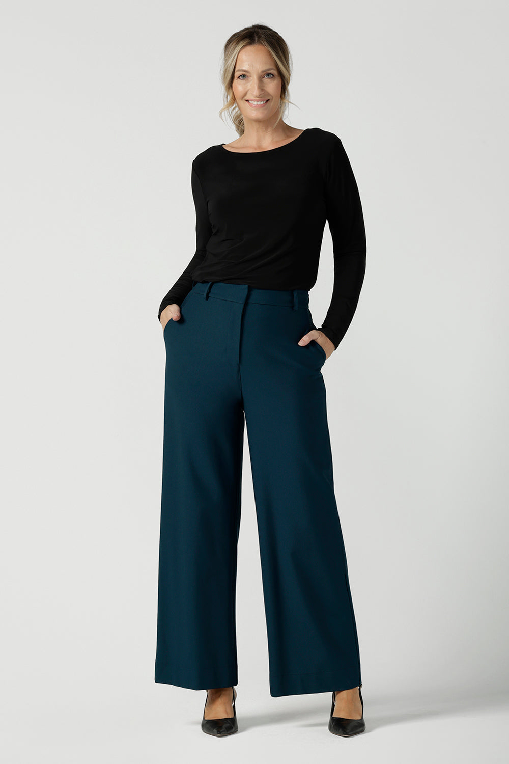 Black Mason top in size 12. Made in Australia for women size 8 - 24. Long sleeve top made in easy care jersey. Made in Australia for women size 8 - 24. Styled bak with Kade pant in petrol.