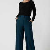 Black Mason top in size 12. Made in Australia for women size 8 - 24. Long sleeve top made in easy care jersey. Made in Australia for women size 8 - 24. Styled bak with Kade pant in petrol.