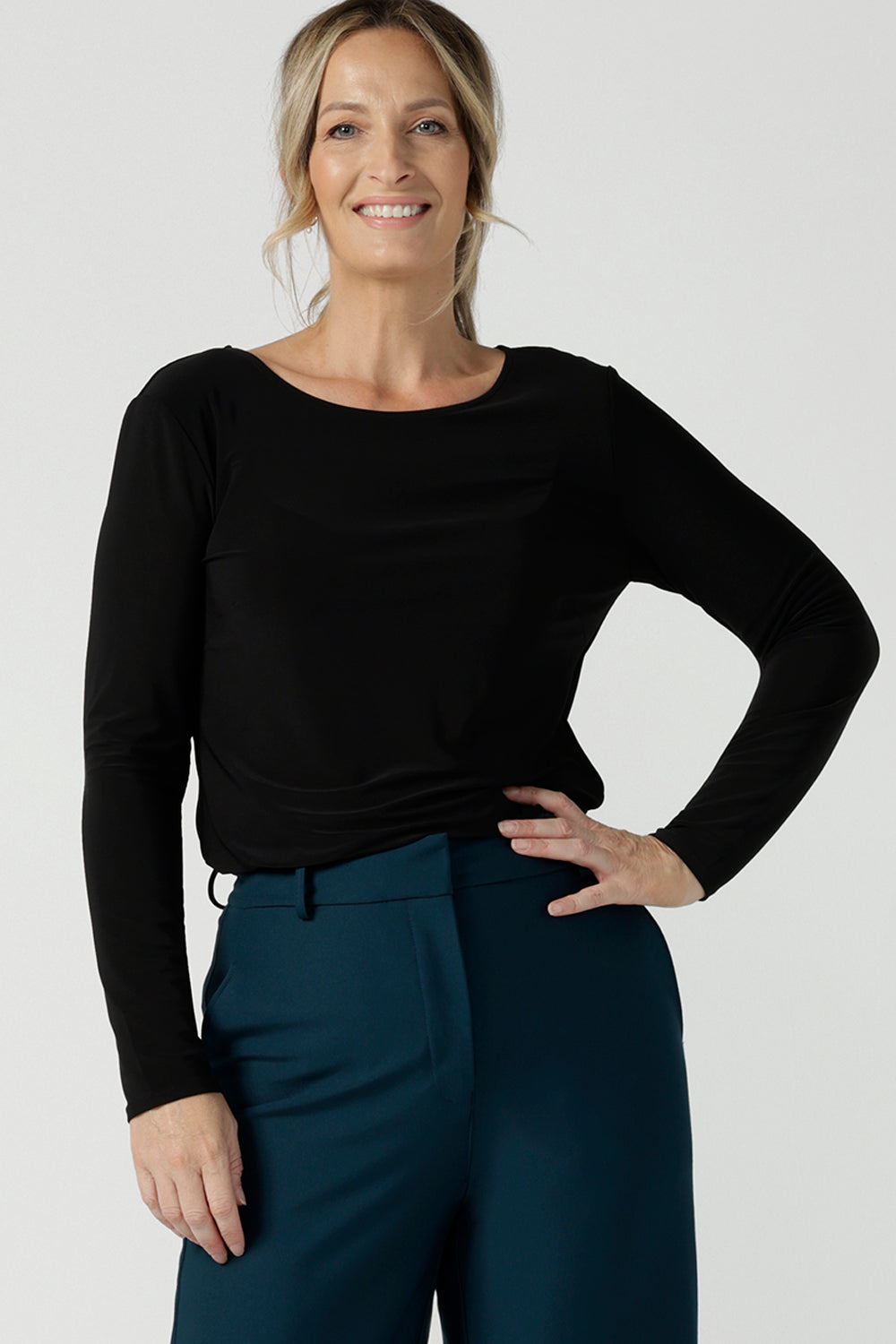 Black Mason top in size 12. Made in Australia for women size 8 - 24. Long sleeve top made in easy care jersey. Made in Australia for women size 8 - 24. Styled bak with Kade pant in petrol. 