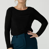 Black Mason top in size 12. Made in Australia for women size 8 - 24. Long sleeve top made in easy care jersey. Made in Australia for women size 8 - 24. Styled bak with Kade pant in petrol. 