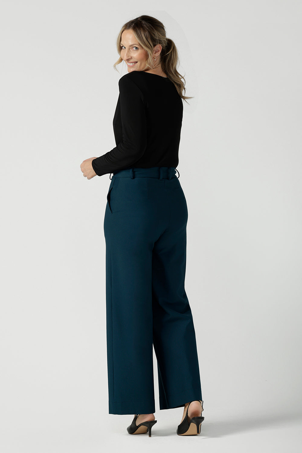 Black Mason top in size 12. Made in Australia for women size 8 - 24. Long sleeve top made in easy care jersey. Made in Australia for women size 8 - 24. Styled bak with Kade pant in petrol.