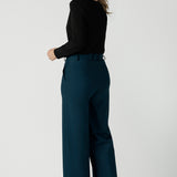 Black Mason top in size 12. Made in Australia for women size 8 - 24. Long sleeve top made in easy care jersey. Made in Australia for women size 8 - 24. Styled bak with Kade pant in petrol.