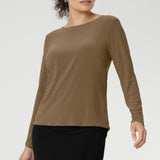 Mason features a close-to-body silhouette with flattering bust darts for subtle shaping, making it ideal for layering or wearing on its own as the seasons change. The straight front hemline is balanced by a gently curved back hem, adding a modern edge to this clean and polished style. Whether paired with tailored pants for the office or dressed down with denim for the weekend, the Mason Top is a reliable go-to that transitions seamlessly from day to night.