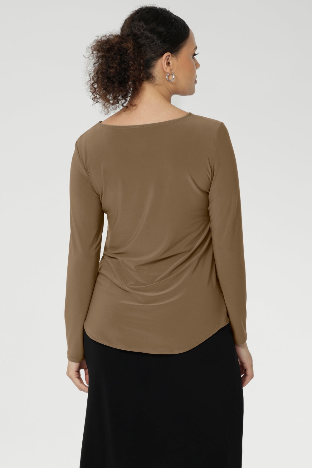 Whether paired with tailored pants for the office or dressed down with denim for the weekend, the Mason Top is a reliable go-to that transitions seamlessly from day to night.