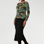 The long sleeves provide added warmth, while the straight hemline at the front and curved hemline at the back, which sits longer, give it a modern touch. Available in sizes 8-24, this top is Australian Made, ensuring quality and craftsmanship. It’s a versatile piece that will effortlessly elevate your everyday wardrobe.