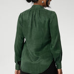 Crafted from suede touch Tencel that has a luxurious feel and drape. Proudly made in Australia in sizes 8-24. The Matisse Shirt in Deep Green is a pull-on style with a tie neckline, crafted from soft, fluid fabric. Blouson sleeves and buttoned cuffs add a polished finish. Matisse is a semi-fitted pull on style V-neckline shirt with extended neck ties, back pleats and bishop sleeves.