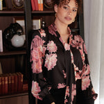 The Matisse Shirt in Romantic Floral is a beautifully feminine and elevated wardrobe essential, perfect for both work and occasion dressing. Crafted from a soft, fluid satin rayon fabric, this semi-fitted shirt features a pull-on design with a graceful V-neckline and extended neck ties that can be styled in multiple ways.