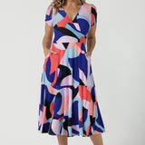 The Mavi Dress in Amalfi is a fixed wrap dress in midi length. A abstract print with a short sleeve. Based on our best selling Bettina dress, this style is great to take you from desk to dinner. Petite to plus size women size 8-24.