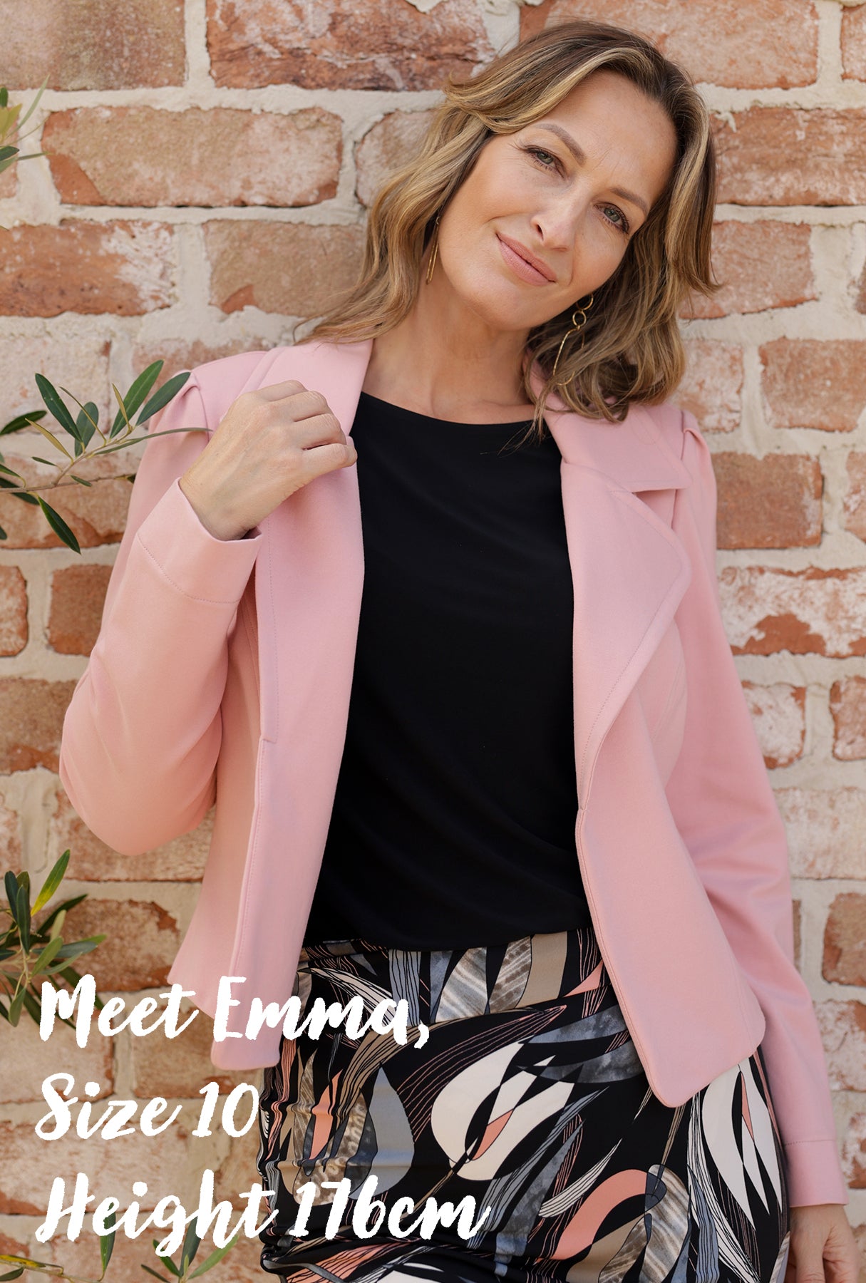 Introducing L&F's (Australian and New Zealand women's fashion label, Leina & Fleur's) model muse for the month, Emma, a forty plus size 10 woman wearing a tailored work jacket in blush pink.