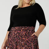 A size 18 woman wears the Melissa Dress in Terrazzo. A jersey dress with a printed skirt and pockets. Jersey dress for petite to plus size women size 8 - 24 made in Australia fashion