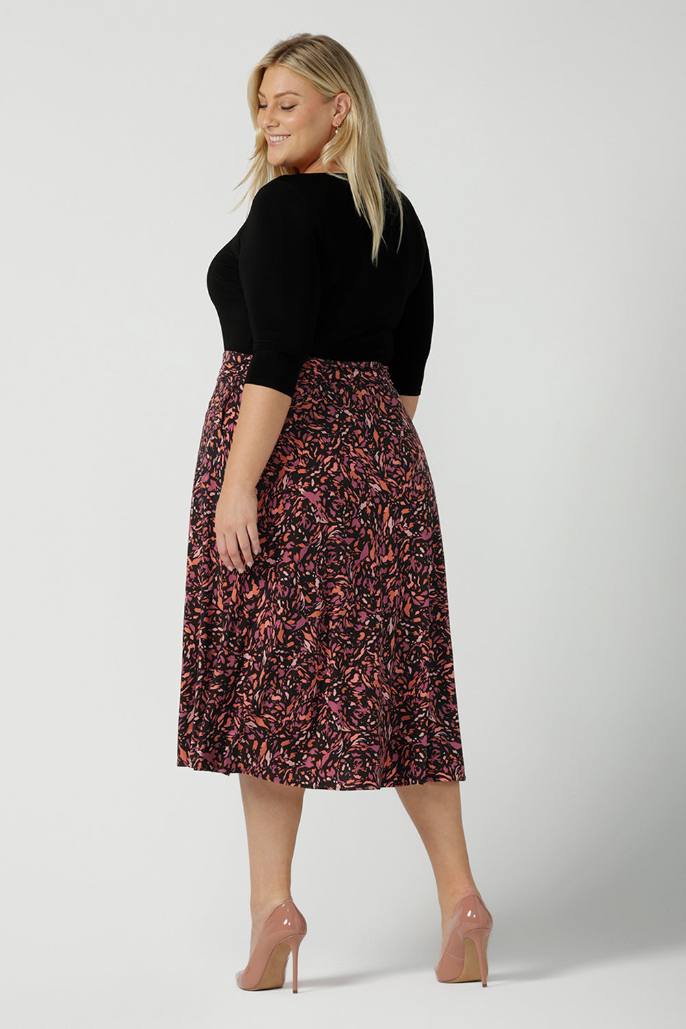 A size 18 woman wears the Melissa Dress in Terrazzo. A jersey dress with a printed skirt and pockets. Jersey dress for petite to plus size women size 8 - 24 made in Australia fashion