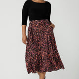 Size 10 woman wears the Melissa Dress in Terrazzo. A jersey dress with a printed skirt and pockets. Jersey dress for petite to plus size women size 8 - 24 made in Australia fashion 