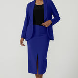 Front view of a size 10 model wears the Merit Blazer in Cobalt, a corporate casual blazer suit set made for women size 8-24. . Made in Australia for women. Petite to plus size.