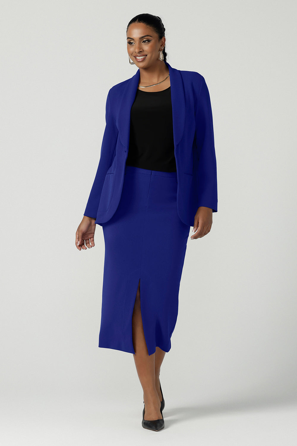 Front view of a size 10 model wears the Merit Blazer in Cobalt, a corporate casual blazer suit set made for women size 8-24. . Made in Australia for women. Petite to plus size.