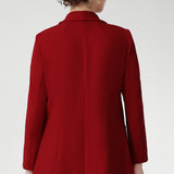 This red work blazer is worn with red workwear pants and red cami top. Curved hemline and front pockets. Made in Australia for women size 8 - 24.