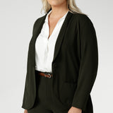 Womans plus size friendly blazer is made from easy care Scuba crepe jersey fabric. Crafted with functional patch pockets, tailored shawl collar and covered front button. Woman's blazer will have you looking stylish in all corporate and casual occasions. Woman's workwear clothing made in Australia sizes 8-24. 