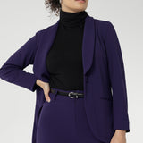 Redefine power dressing with the Merit Blazer, a modern classic crafted from our premium Scuba Crepe fabric for a sleek, structured fit with just the right amount of stretch. This expertly tailored jacket delivers timeless sophistication with a contemporary edge, featuring a sharp tuxedo-style shawl collar, a button-up front, and full-length sleeves with foldable cuffs for versatile styling.