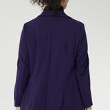 This expertly tailored jacket delivers timeless sophistication with a contemporary edge, featuring a sharp tuxedo-style shawl collar, a button-up front, and full-length sleeves with foldable cuffs for versatile styling.
