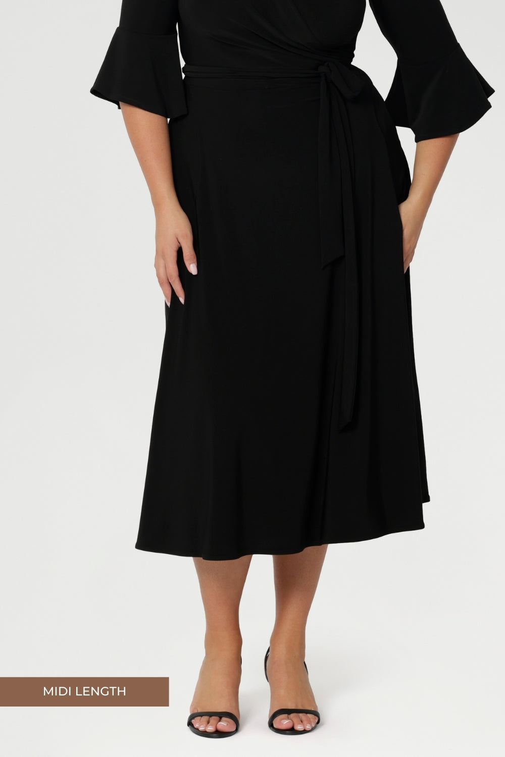 As part of the Made For You collection, each piece is crafted locally and available by pre-order, ensuring sustainable production and thoughtful design. Offered in a size-inclusive range from 8 to 24, this black wrap dress is tailored to complement every shape and style.