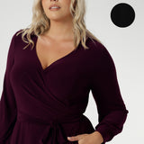 Offered in a size-inclusive range from 8 to 24, this black wrap dress is tailored to complement every shape and style. Refined, effortless, and made just for you. A custom made dress that goes everywhere and works for everything.