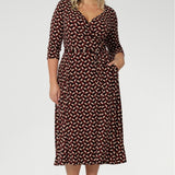 Crafted in Australia from premium, Australian-made stretch jersey, the Made For You collection by Leina + Fleur celebrates versatility, elegance, and individuality. This custom wrap dress is designed to wrap effortlessly around the body, creating a flattering silhouette that moves with you.