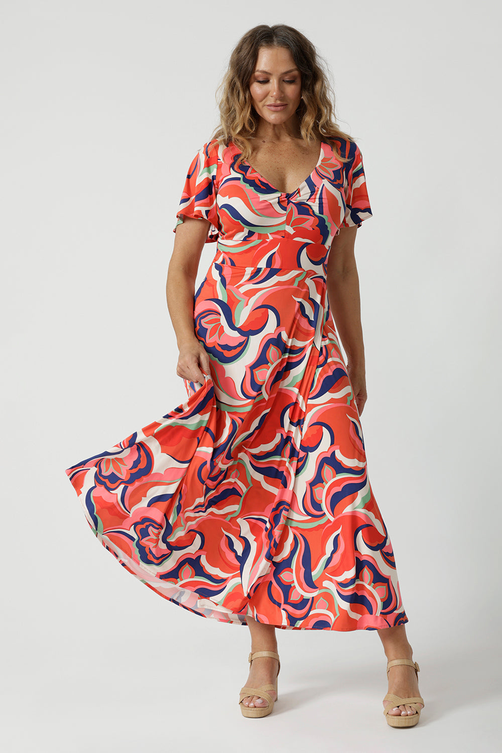  A good maxi dress for summer, this printed jersey dress has a twist front bodice and flutter sleeves. A dress for cruise holidays and resort style, this maxi dress is easy-care and crease-resistant. Made in Australian by Australian and New Zealand women's clothes brand, Leina & Fleur, shop their cruise wear fashions online in sizes 8 to 24.