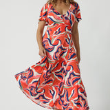  A good maxi dress for summer, this printed jersey dress has a twist front bodice and flutter sleeves. A dress for cruise holidays and resort style, this maxi dress is easy-care and crease-resistant. Made in Australian by Australian and New Zealand women's clothes brand, Leina & Fleur, shop their cruise wear fashions online in sizes 8 to 24.