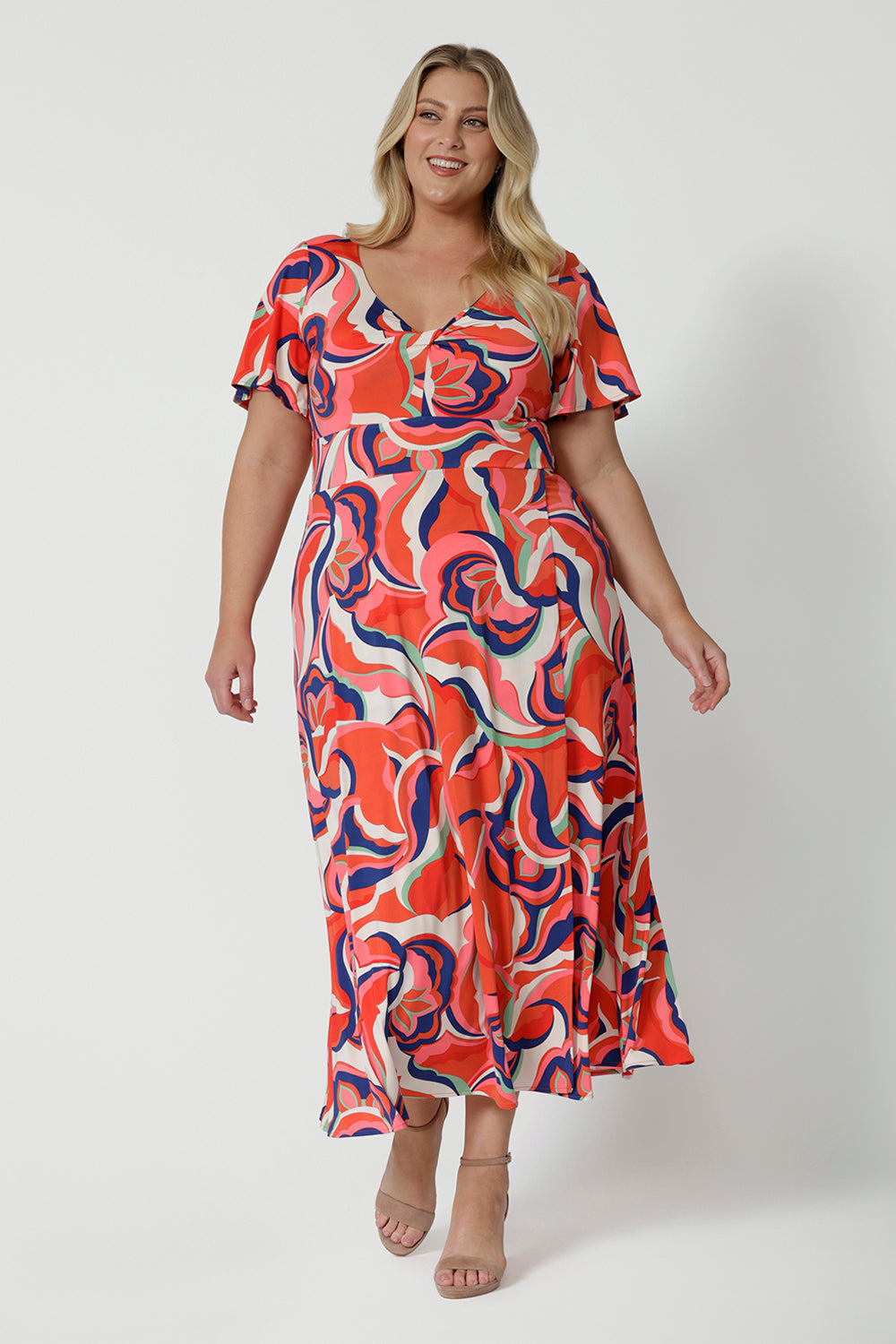 A good summer maxi dress for plus size women, this printed jersey dress has a twist front bodice and flutter sleeves. A dress for cruise holidays and resort style, this maxi dress is easy-care and crease-resistant. Made in Australian by Australian and New Zealand women's clothes brand, Leina & Fleur, shop their cruise wear fashions online in sizes 8 to 24.