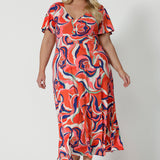 A good summer maxi dress for plus size women, this printed jersey dress has a twist front bodice and flutter sleeves. A dress for cruise holidays and resort style, this maxi dress is easy-care and crease-resistant. Made in Australian by Australian and New Zealand women's clothes brand, Leina & Fleur, shop their cruise wear fashions online in sizes 8 to 24.