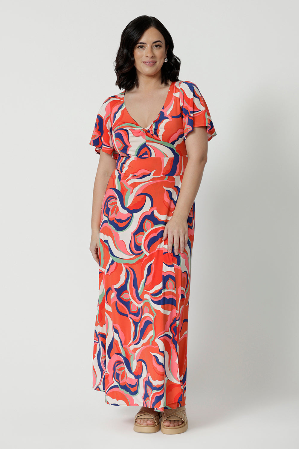 A good summer maxi dress for petite height women, this printed jersey dress has a twist front bodice and flutter sleeves. A dress for cruise holidays and resort style, this maxi dress is easy-care and crease-resistant. Made in Australian by Australian and New Zealand women's clothing label, Leina & Fleur, shop their cruise wear fashions online in sizes 8 to 24.