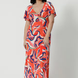 A good summer maxi dress for petite height women, this printed jersey dress has a twist front bodice and flutter sleeves. A dress for cruise holidays and resort style, this maxi dress is easy-care and crease-resistant. Made in Australian by Australian and New Zealand women's clothing label, Leina & Fleur, shop their cruise wear fashions online in sizes 8 to 24.