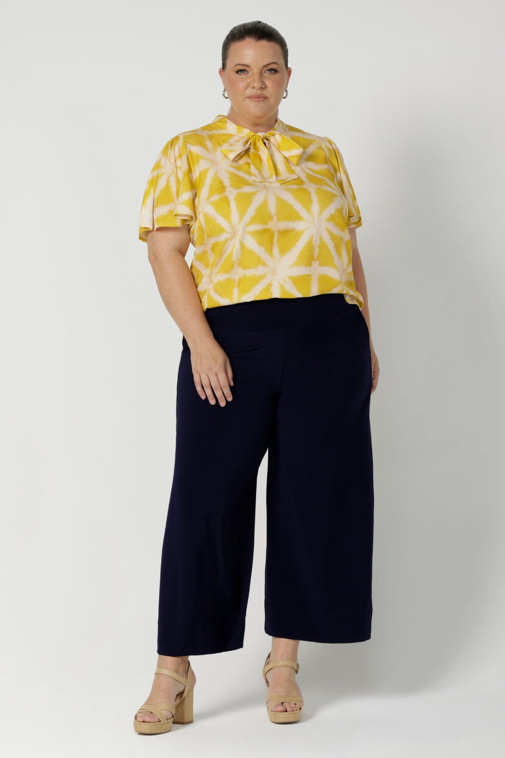 Made from eco-friendly Tencel viscose fabric, it feels soft to the touch, breathable, and lightweight on the body, providing all-day comfort. Proudly made in Australia, this top is a perfect blend of sustainability, style, and ease. Available in sizes 8-24.