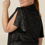 Close up of the flutter sleeves with slit detail on an evening top by Australian fashion and occasionwear brand, Leina  & Fleur. Shop thier evening and event wear online in sizes 8 to 24.