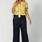 The shirt combines eco-conscious materials with thoughtful design, making it a staple for both work and play. Unique neckline with tie can be done up for added coverage or left undone for a more relaxed, open look, allowing you to customise your style. Shop this look in sizes 8-24.
